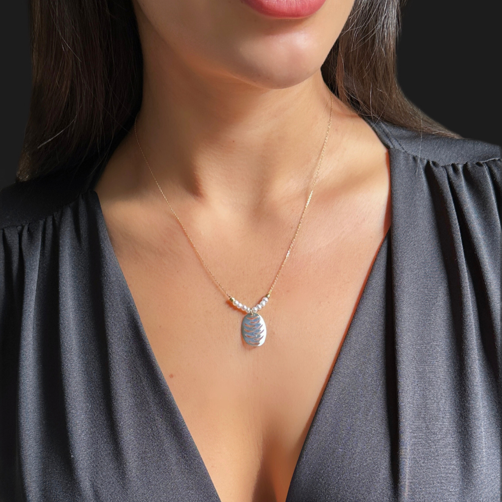 White gold oval shaped pendant with pearls - yellow gold necklace