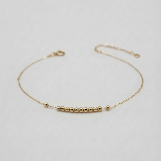 Straight line mini balls gold bracelet