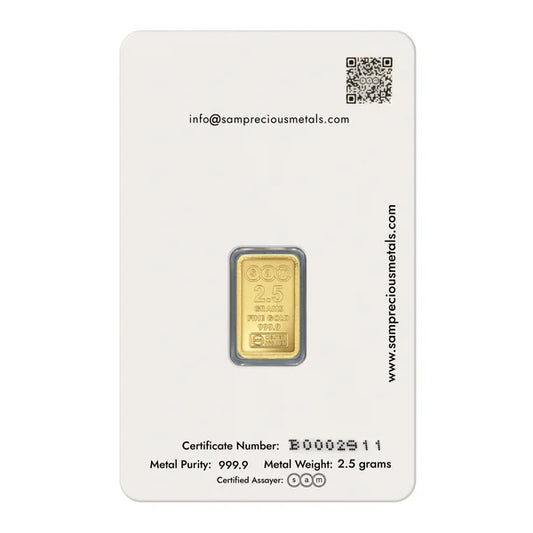 Gold bar on a white card with certification details