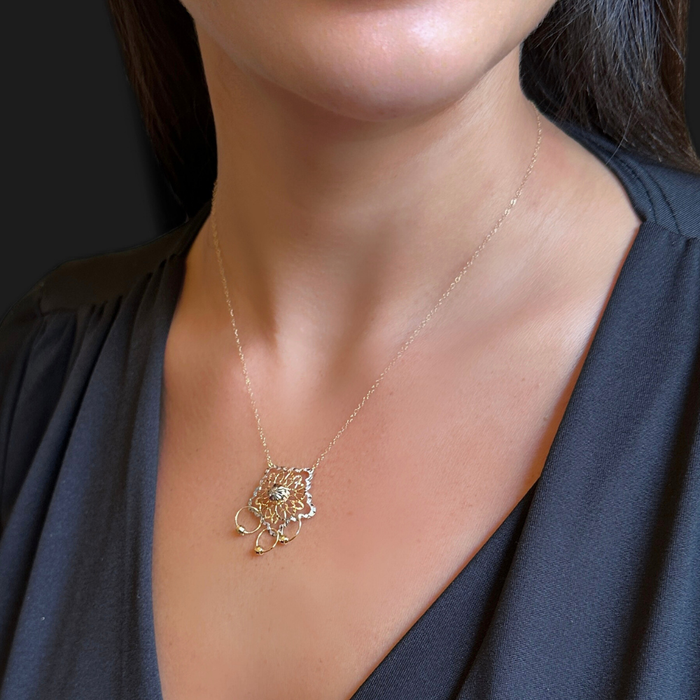 White edged yellow gold flower necklace