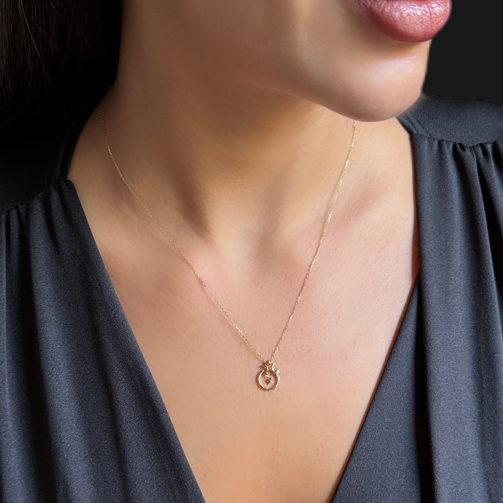 Ring and stars shapes gold necklace