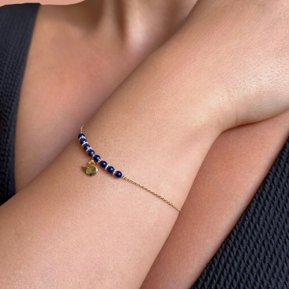 Swan charm - gold bracelet