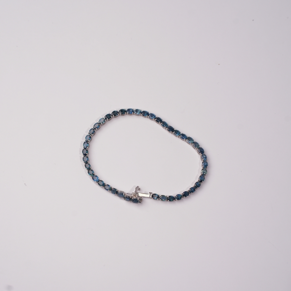 blue sapphire - white gold tennis bracelet
