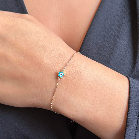 سوار ذهبي صغير على شكل نجمة وعين