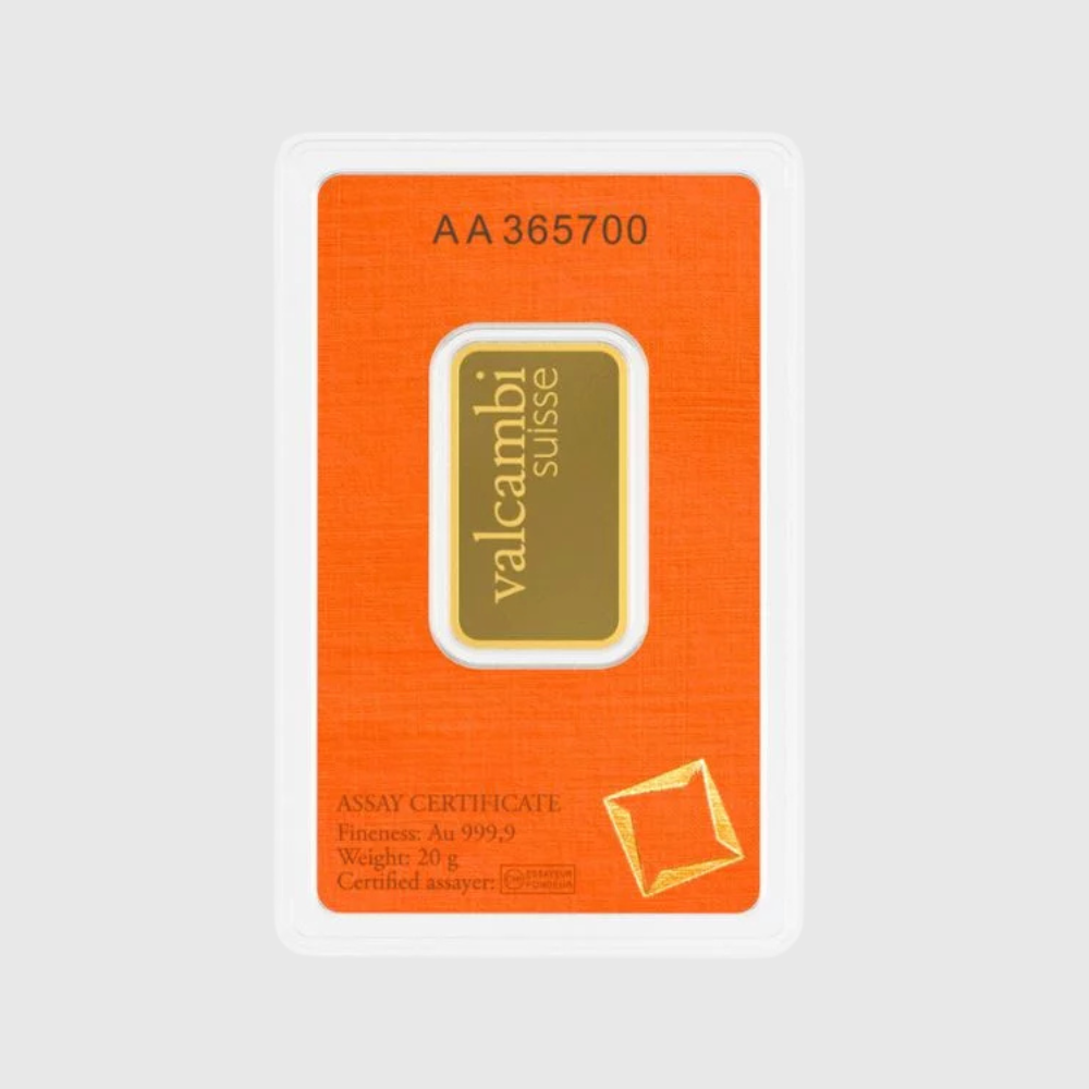 Valcambi Swiss gold bar packaging with orange background and gold logo