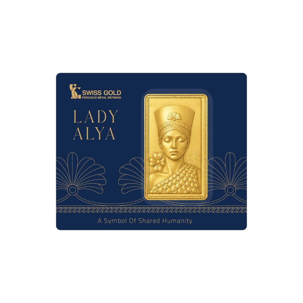 Gold bar with 'Lady Alya' design on a blue packaging with Swiss Gold branding.