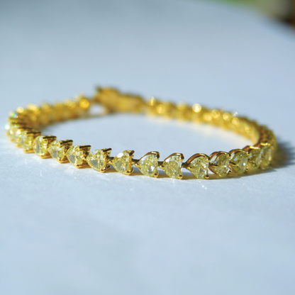 Fancy Yellow heart shaped Diamond, tennis bracelet