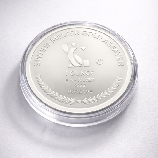 Silver coin in a protective case with 'Swiss Melter Gold Assayer' branding on a white background