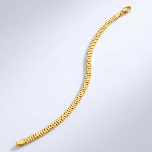 21k Gold bracelet on a light gray background