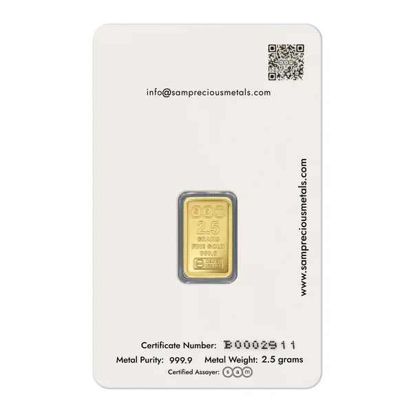 Gold bar on a white card with certification details