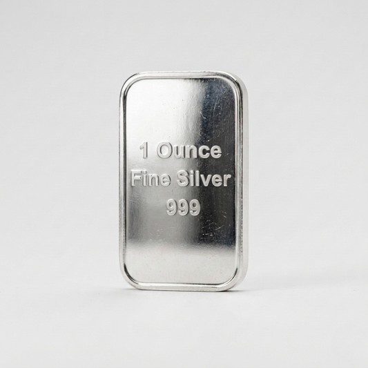 Silver bar labeled '1 Ounce Fine Silver 999.9' on a white background