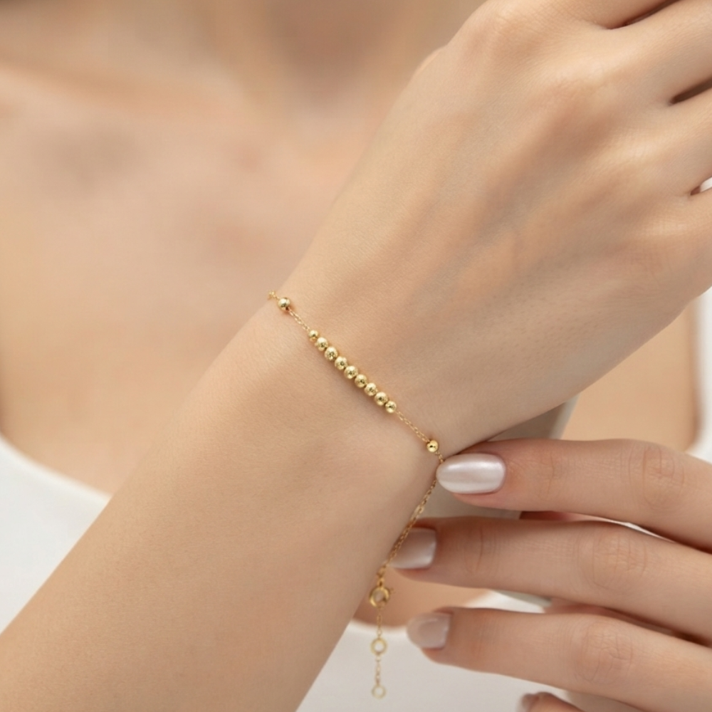 Straight line mini balls gold bracelet