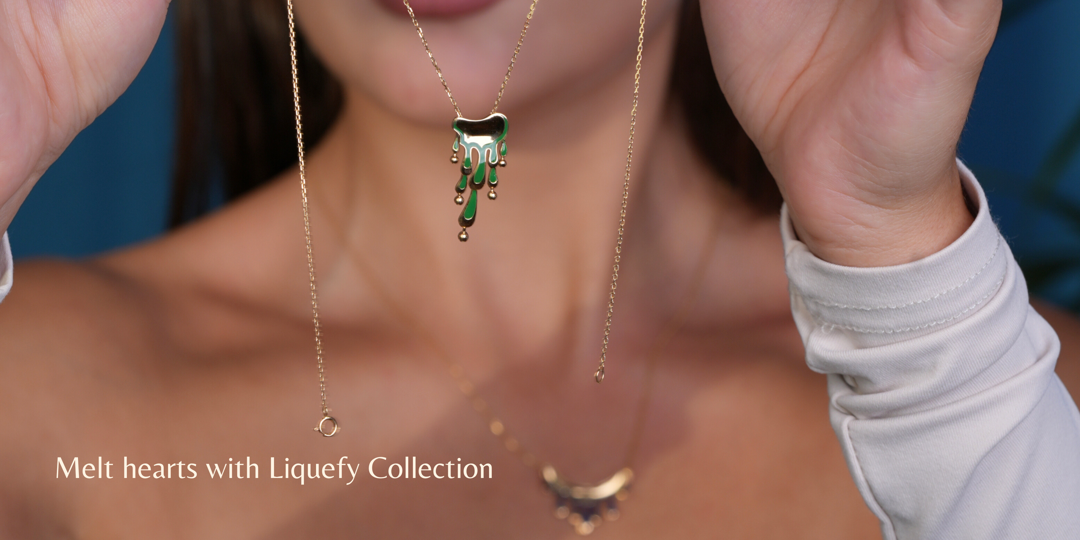 model wearing liquefy collection of lulia jewelry