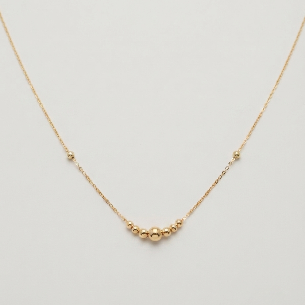 One large ball - straight line ball necklace