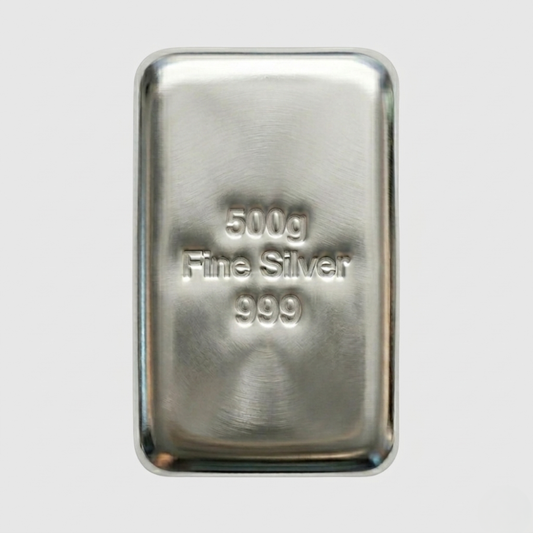 Silver bar with '500g Fine Silver 999' text on a light gray background
