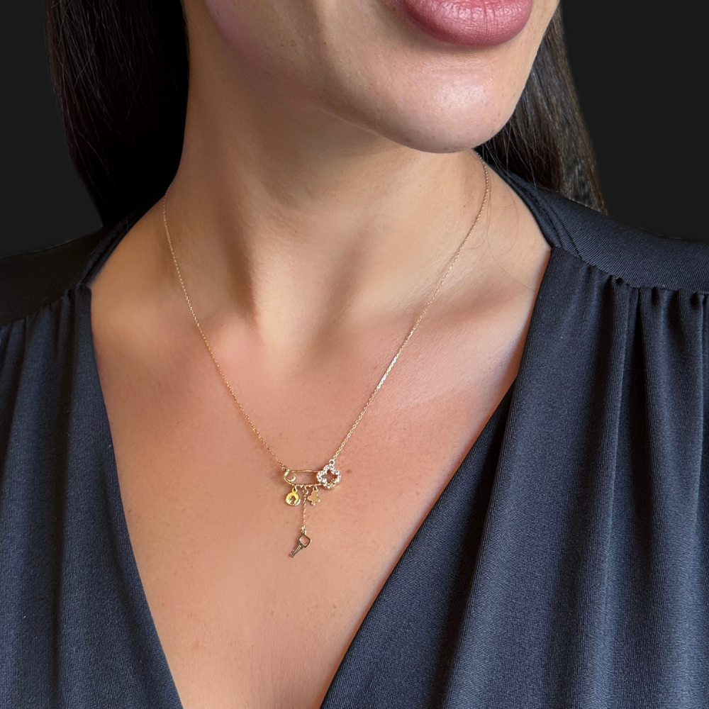 Safety pin necklace – clover and charms