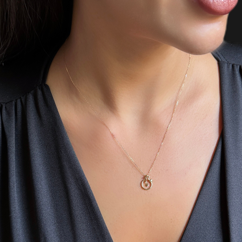 Ring and stars shapes gold necklace