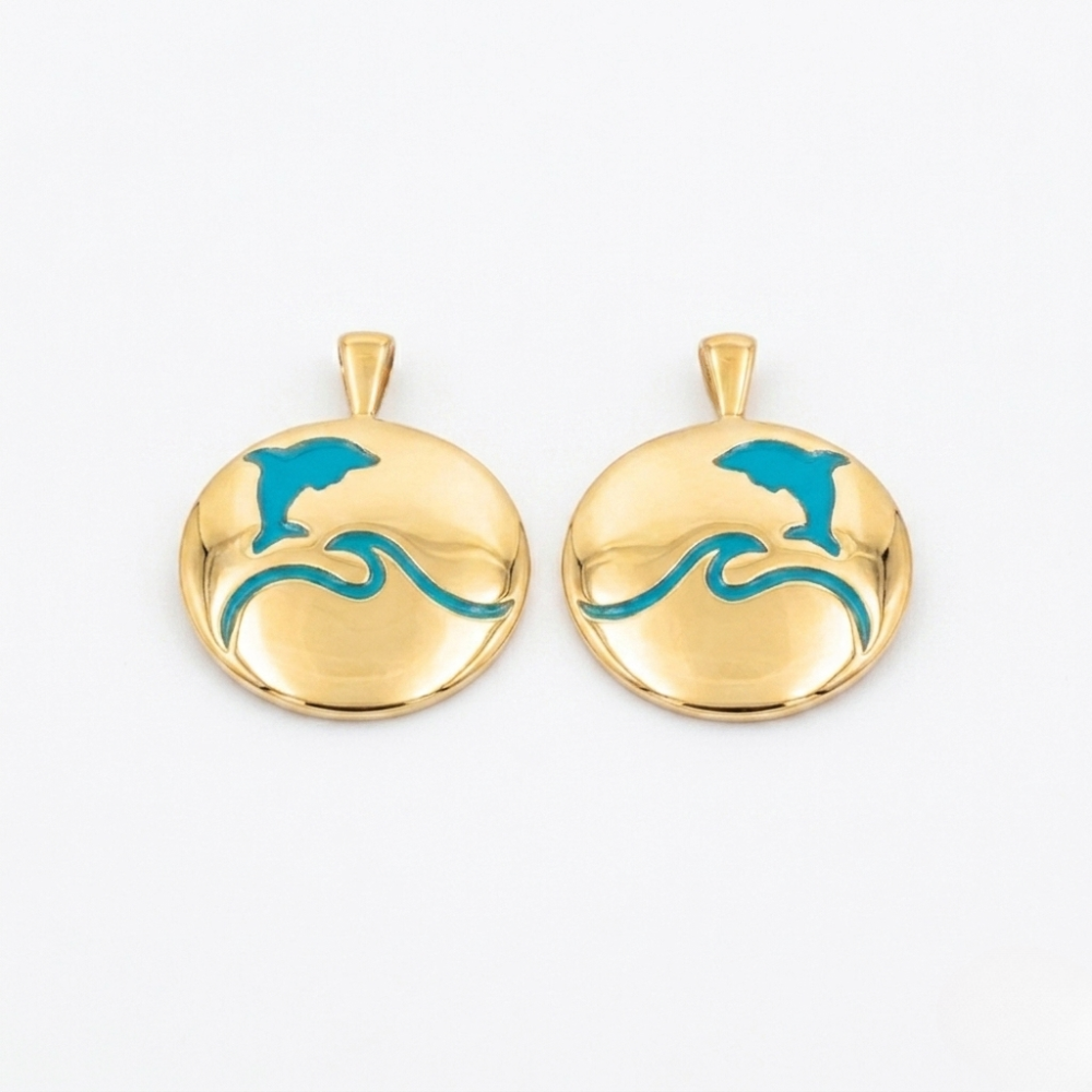 That's so summer - lulia jewelry Two gold earrings with blue wave designs on a white background