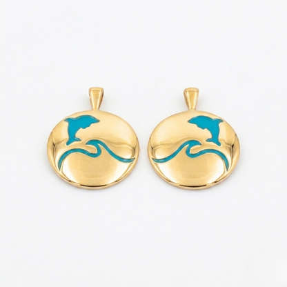 That's so summer - lulia jewelry Two gold earrings with blue wave designs on a white background