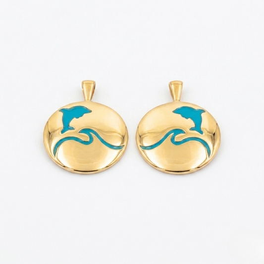 That's so summer - lulia jewelry Two gold earrings with blue wave designs on a white background